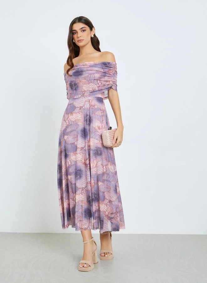 ستايلي فستان طويل بأكتاف مكشوفة وحافة واسعة